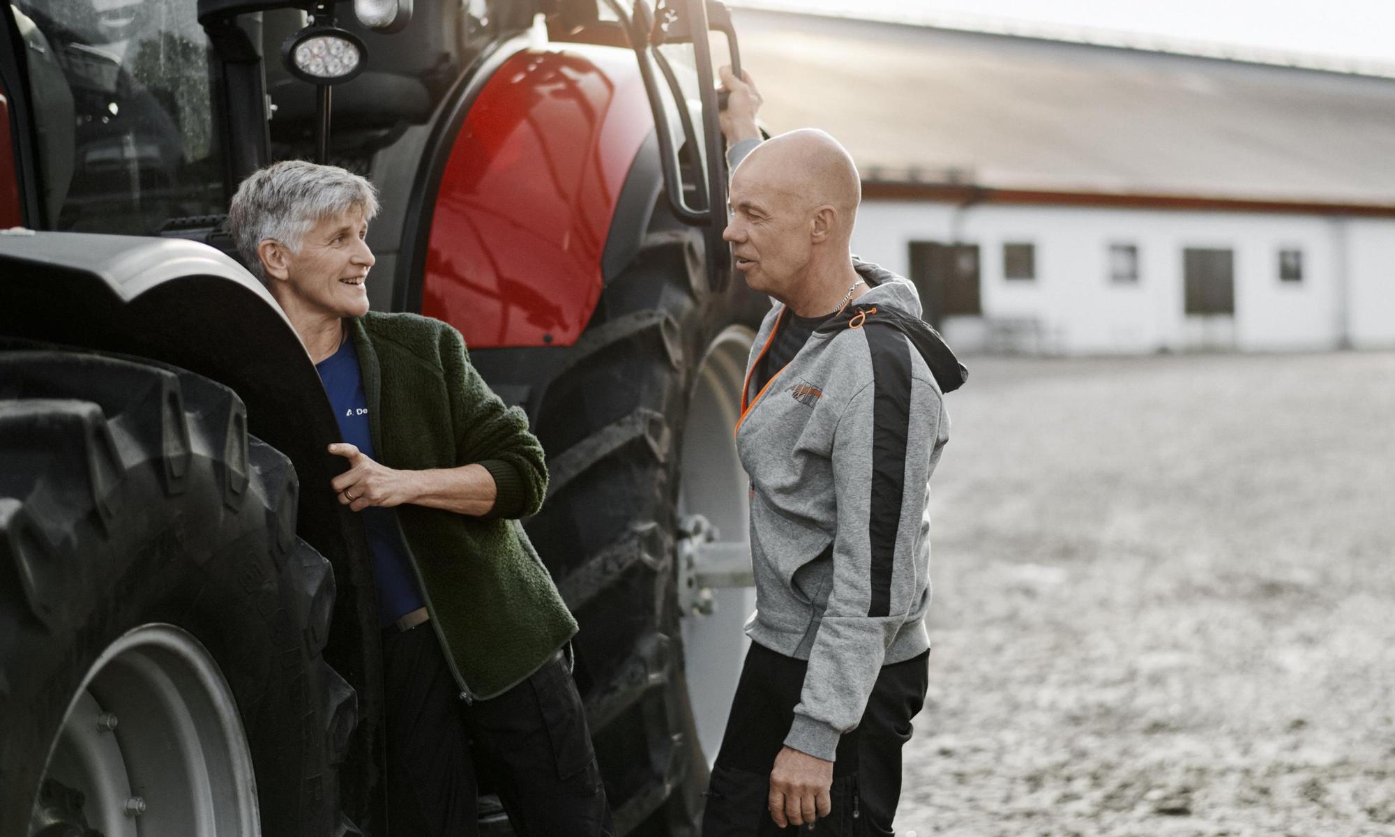 A meeting by the tractor