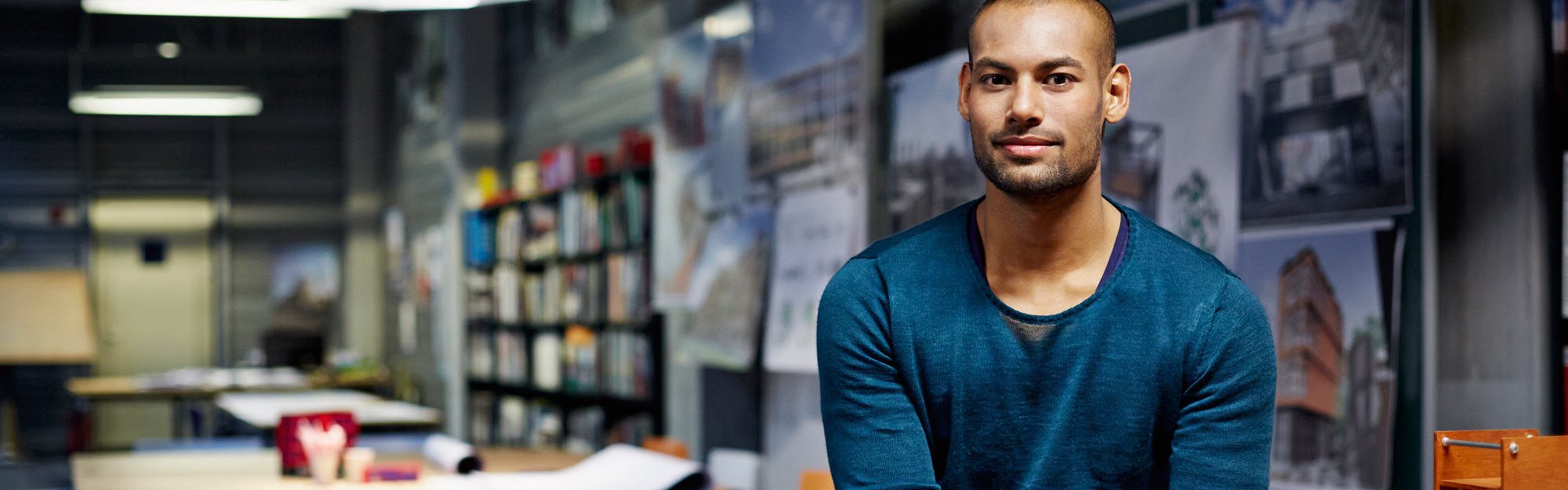 Young man in architect office